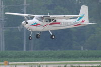 N3887D @ KDPA - Cessna 182A, N3887D, cross wind landing RWY 2L KDPA. - by Mark Kalfas