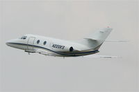 N220KS @ KDPA - FALCON 10, N220KS, departing RWY 2L KDPA. - by Mark Kalfas