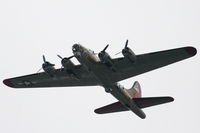N93012 @ KDPA - Boeing B-17G, NL93012, a climbing left turn to 270' after departing RWY 20R KDPA... - by Mark Kalfas