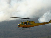 N60124 - Fighting a fire in Stokes County, NC - by Charles Hildebrant