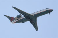 N27318 @ KPSP - America West/Mesa Airlines CL-600-2B19, N27318 on approach to KPSP. - by Mark Kalfas