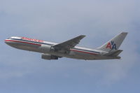 N335AA @ KLAX - American Airlines Boeing 767-223, N335AA departing 25R KLAX. - by Mark Kalfas