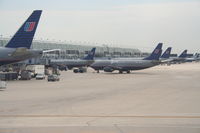 N373UA @ KORD - United Airlines Shuttle Boeing 737-322, N373UA pushing back from B-13 KORD. - by Mark Kalfas