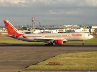 VT-IWB @ EGLL - Air India applying speed brakes - by Robert Kearney
