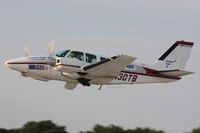 N30TB @ OSH - 1970 Beech 58, c/n: TH-74 - by Timothy Aanerud