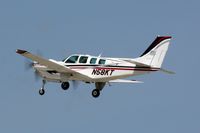 N58KT @ OSH - 2000 Raytheon Aircraft Company 58, c/n: TH-1955 - by Timothy Aanerud