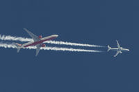 UNKNOWN @ NONE - Air India Triple Seven crosses the contrail of an unknown 737 - by FBE