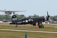 N179PT @ OSH - N8407 in the background at Airventure 2009 - Oshkosh, Wisconsin - by Bob Simmermon