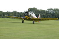 LN-AMY @ EGTH - 3. FT391 T-6 Harvard departing the Shuttleworth Military Pagent air Display Aug 09 - by Eric.Fishwick