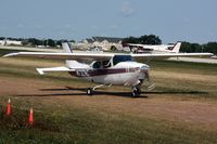 N732NC @ OSH - 1976 Cessna 210M, c/n: 21061635 - by Timothy Aanerud