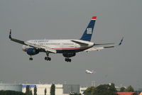 N941UW @ EBBR - flight US750 is descending to rwy 25L while flight BA391 takes off from rwy 25R - by Daniel Vanderauwera
