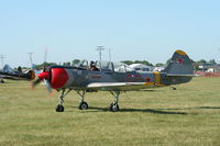 N207YK @ KOSH - YAK 52 - by Mark Pasqualino