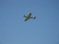 N1940K @ CMA - 2003 Deford Mk.IX JURCA MJ100 full size wooden replica Supermarine Spitfire Mk.IX, Allison 1,480 Hp, three-blade prop, airshow fly by - by Doug Robertson