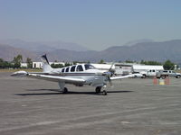 N575GW @ POC - Taxiing through the maze of Fire Birds and equipment enroute to Howard Aviation - by Helicopterfriend