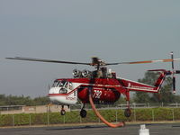 N792HT @ POC - Making sure hose is out of the way - by Helicopterfriend
