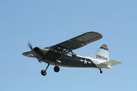 N67174 @ KOSH - Stinson L-5 - by Mark Pasqualino