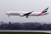 A6-EBX @ EGBB - Emirates B777 landing at Birmingham UK in torrential rain - by Terry Fletcher