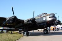 C-GVRA @ OSH - 1945 Victory Aircraft AVRO LANCASTER MK X, c/n: FM 213 - by Timothy Aanerud