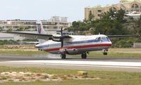 N355AT @ TNCM - landing on runway 10 from tjsj - by daniel jef