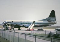 ZK-TEA @ YMEN - TEAL Lockheed L188 Electra at Essendon early 60's. From a colour transparency. TEAL is the former name of Air New Zealand.