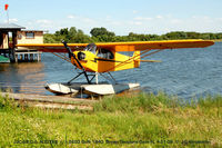 N32768 @ F57 - Beached at Brown's Seaplane Base - by J.G. Handelman