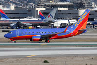 N227WN @ LAX - Southwest Airlines N227WN holding short of RWY 25R after arrival on 25L. - by Dean Heald