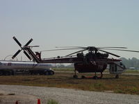 N716HT @ POC - Mechanic checking bird before leaving on mission - by Helicopterfriend