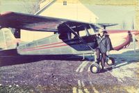N3198A - Wesley Miller with plane on his farm - by Margaret Miller