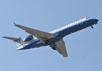 N519LR @ KORD - Mesa Airlines/United Express CL-600-2C10, N519LR RWY 10 approach KORD - by Mark Kalfas