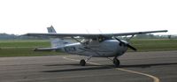 N2412W @ KAXN - 2007 Cessna 172S Skyhawk on the ramp. - by Kreg Anderson