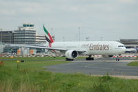 A6-EBV @ EGCC - Emirates - Boeing 777-31HER - Taxiing - by David Burrell