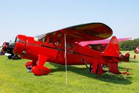 N22410 @ IA27 - At the Antique Airplane Association Fly In. UC-70 42-38365. - by Glenn E. Chatfield