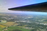 N3193G - Looking aft at the right horizontal stabilizer over Urbana, Ohio at 2500'. - by Bob Simmermon