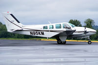 N95KM @ KEHO - Taxiing for departure on a rainy day. - by Jamin