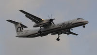 N409QX @ KLAX - Landing 24R at LAX - by Todd Royer