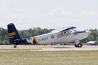 C-FEFT @ KOSH - Taxi to parking - by Todd Royer