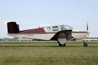 C-FWVN @ KOSH - Taxi to parking - by Todd Royer