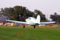 N65296 @ IA27 - At the Antique Airplane Association Fly In.  Setting sun - by Glenn E. Chatfield