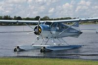 N450DM - Beaching at the Last Big Splash In - by Jack Suske