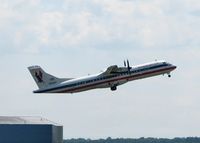 N499AT @ SHV - Off of runway 23 at Shreveport Regional. - by paulp