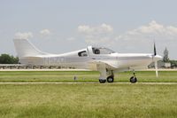 N5ZQ @ KOSH - Taxi for departure - by Todd Royer