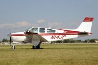 N14JP @ KOSH - Taxi to parking - by Todd Royer