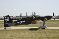 N158CF @ KOSH - Taxi for departure - by Todd Royer