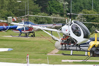 G-DCBI @ EGCB - Busy Helicopter scene. - by MikeP