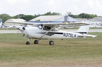 N375LA @ KOSH - Taxi to parking - by Todd Royer