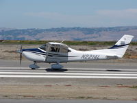 N2214L @ SQL - 2005 Cessna 182T on take-off - by Steve Nation