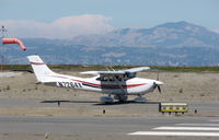 N7264X @ SQL - 1999 Cessna 182S taxiing for t/o to Monterey Penisula Airport - by Steve Nation