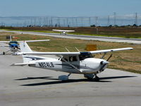 N739TW @ PAO - 2005 Cessna 172S taxiing (lots of Cessna activity in this scene) - by Steve Nation