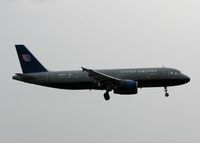 N413UA @ DFW - Landing on 18R at DFW. Rainy day! - by paulp