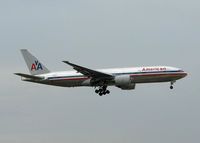 N751AN @ DFW - American 777 landing on 18R from Tokyo Narita. Rainy day at DFW! - by paulp